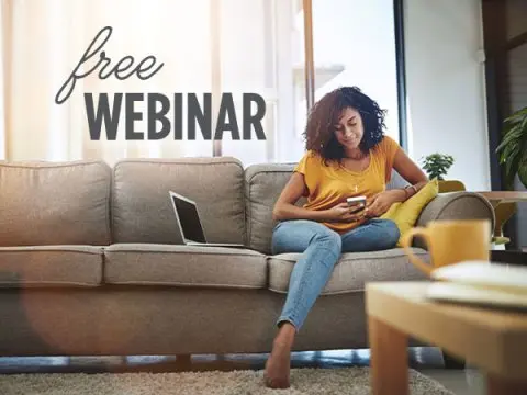 Free Webinar, woman using phone on couch